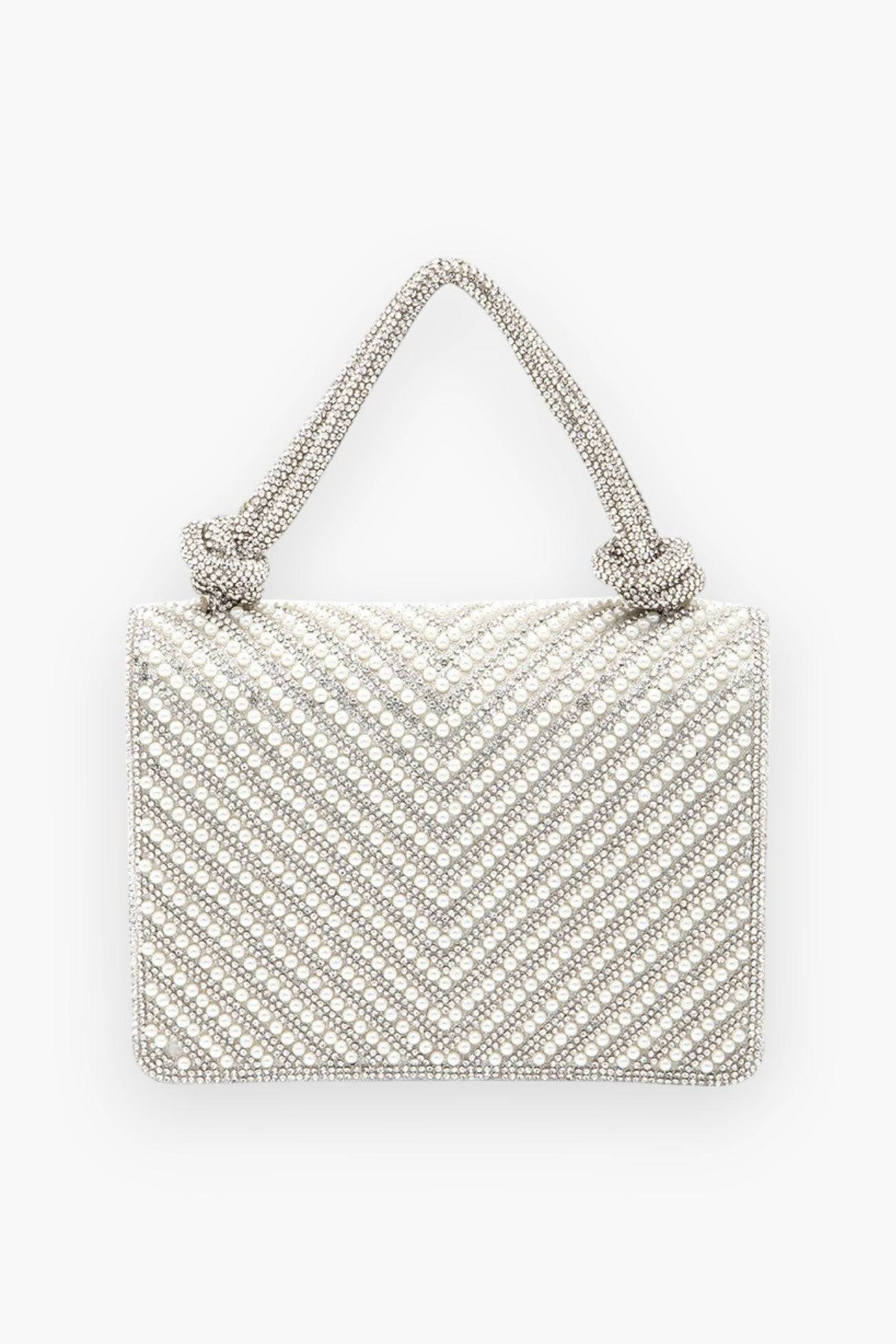 Pearl studded rhinestone handle clutch bag with a chevron pattern, featuring a structured design and elegant detailing for a sophisticated look.