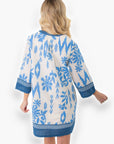 Back view of the Priscilla Blue Print Kaftan Dress showcasing its flowing silhouette and vibrant blue print on lightweight fabric.