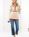 Stylish Quarter Zip Sweater in garnet and black with contrast detailing. A comfortable knit sweater perfect for layering and everyday wear.