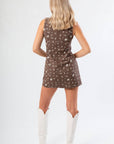 Back view of Giddy Up Brown Cowboy Print Mini Dress featuring a fitted silhouette and zipper closure, ideal for western-themed events.