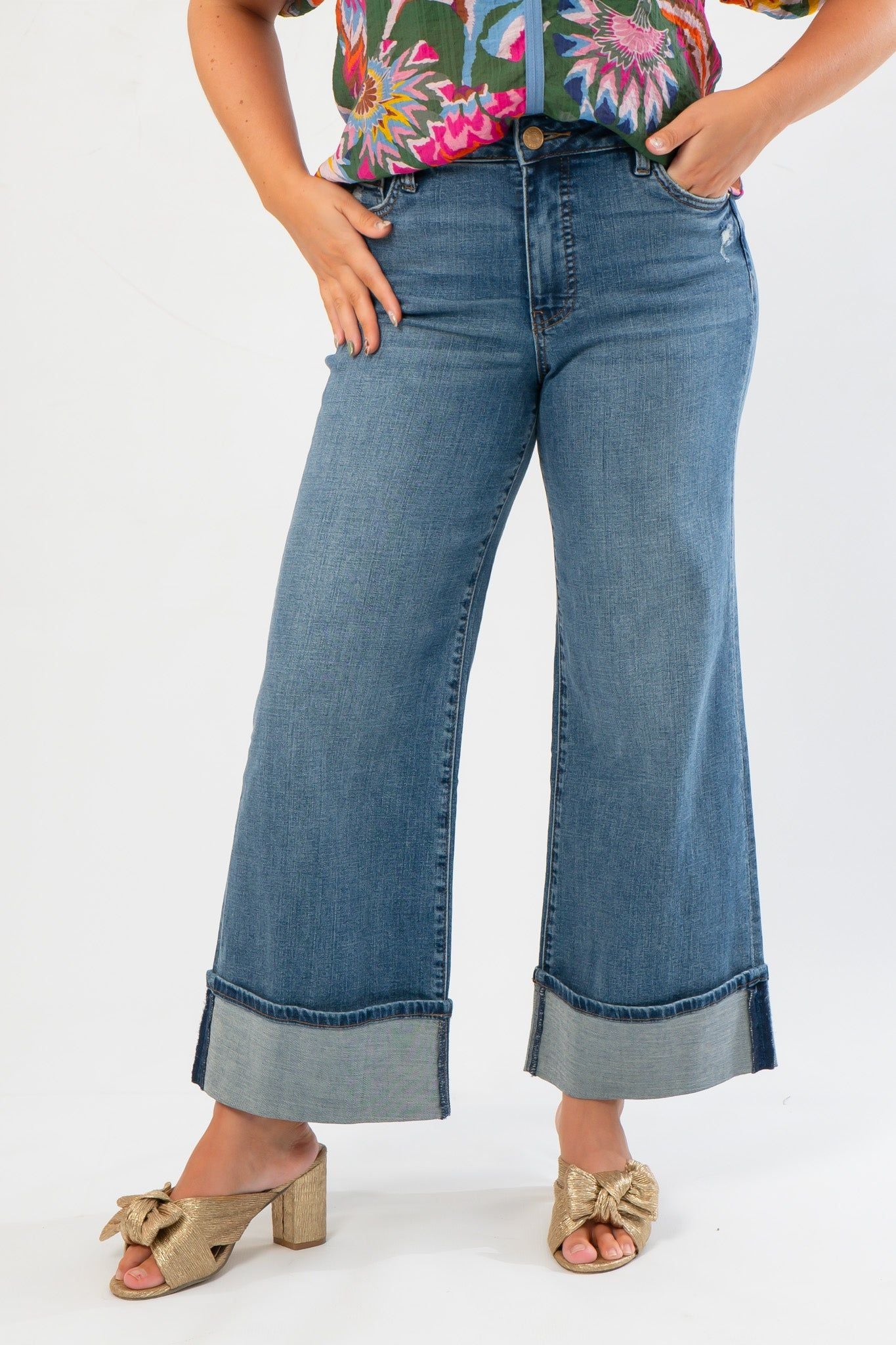Front view of Kut From The Kloth Meg High Rise Wide Leg Jeans – Medium Wash, showcasing high-rise fit and wide-leg cut with turned-up cuffs.
