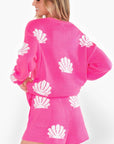 Back view of the Show Me Your Mumu Hot Pink Shell Go To Sweater, showcasing its relaxed fit and stylish shell pattern. A must-have for effortless layering.