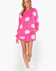 Full-body view of the Show Me Your Mumu Hot Pink Shell Go To Sweater paired with matching shorts and white sneakers. A trendy and comfortable outfit for any occasion.