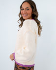 breathable fall and winter sweater with eye-catching purple accents, relaxed fit varsity sweater great for tailgates and fall game day
