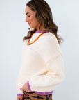 feminine hip-length knit sweater blending comfort with bold details, versatile purple-trimmed sweater for clemson game day