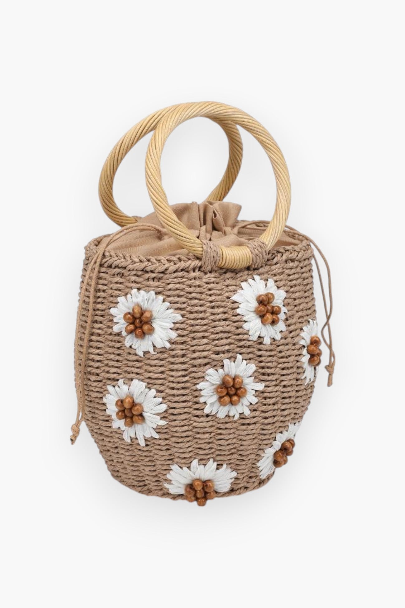 UE Natural Emaline Satchel Purse in tan straw with floral accents and drawstring closure, a trendy boho accessory for vacation or casual wear.