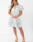 Chic Blue Hydrangea Flutter Sleeve Mini Dress styled for spring events, showcasing its soft floral pattern and relaxed fit.
