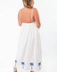 MINKPINK White & Blue Isadora Embroidered Midi Dress with open back and blue palm tree embroidery, perfect for summer style and beach vacations.