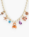 Colorful Sea Life Charm Pearl Necklace featuring vibrant sea creature charms like a crab, starfish, and coral on glossy pearl beads.