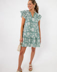 Lightweight Sullivan Seafoam Garden Bloom Ruffle Dress styled with wedge sandals, ideal for warm-weather outings and Easter events.