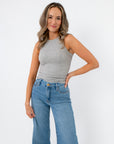 Free People Heather Grey So Soft Seamless Modal Tank styled with wide-leg jeans, showcasing its soft, lightweight fit for casual wear.