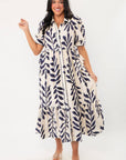 Harmony Navy & Cream Puff Sleeve Collared Midi Dress featuring short puff sleeves, navy botanical print, and a relaxed summer silhouette.