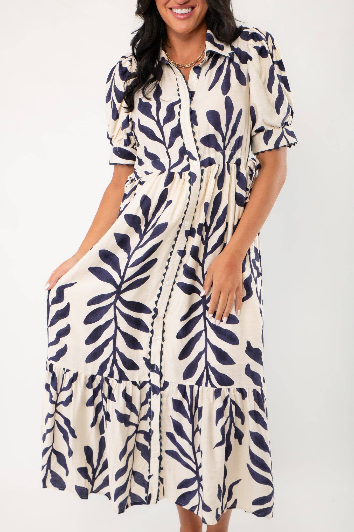 Front detail of Harmony Navy & Cream Puff Sleeve Collared Midi Dress with button-down design, gathered waist, and tiered skirt for summer style.