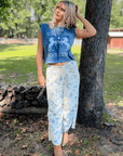 Trail Blazer Blue Tank Top styled with floral lace-up pants and boots, perfect for fall country concerts or casual outings.