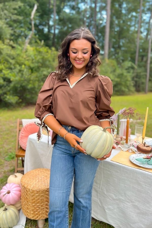 Hazel Brown Whipstitch Collared Blouse styled for fall with puff sleeves and contrast stitching, perfect for outdoor gatherings or Thanksgiving looks.