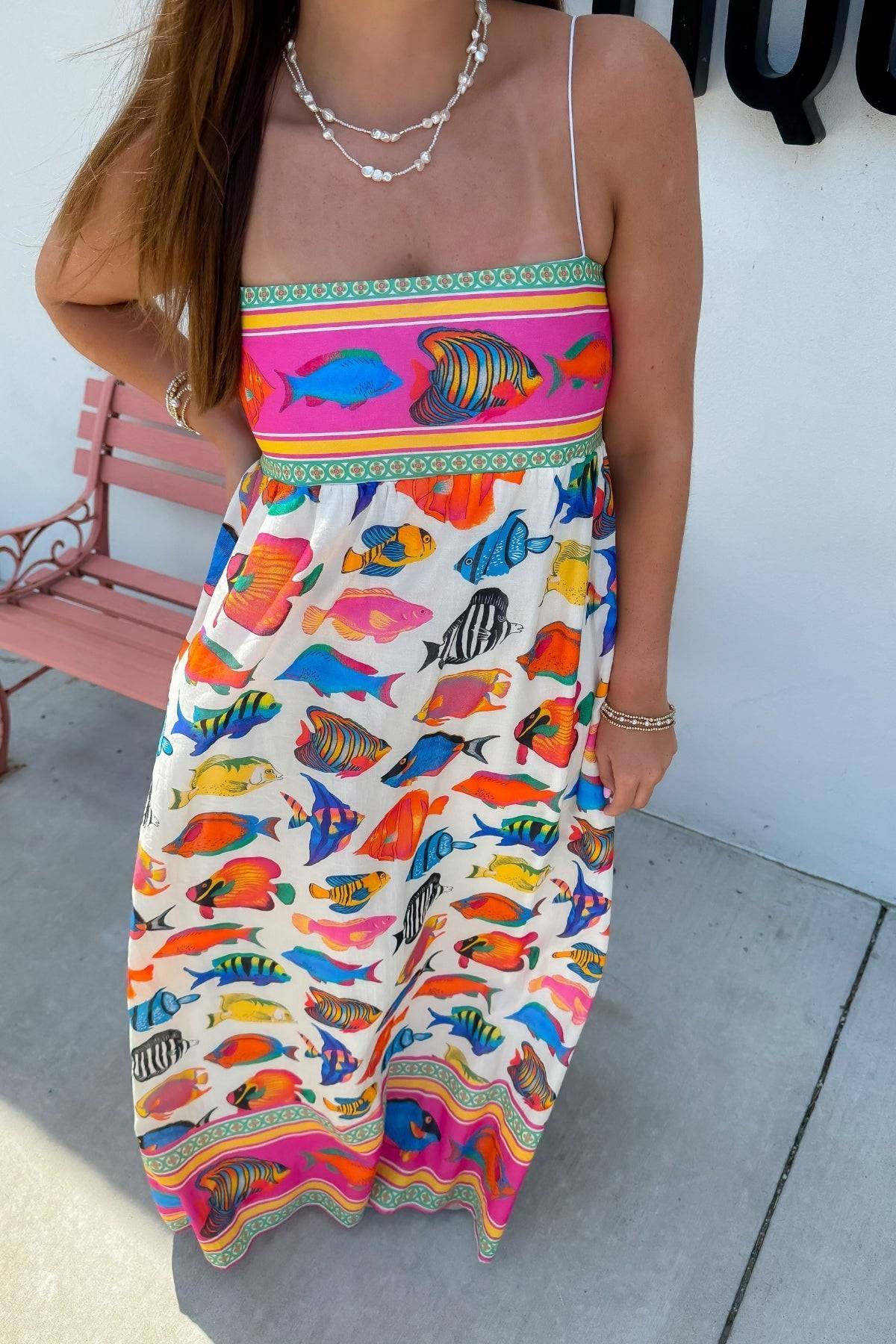 Front view of Show Me Your Mumu Rainbow Reef Skylar Maxi Dress featuring vibrant multicolor fish pattern and strapless flowy design.