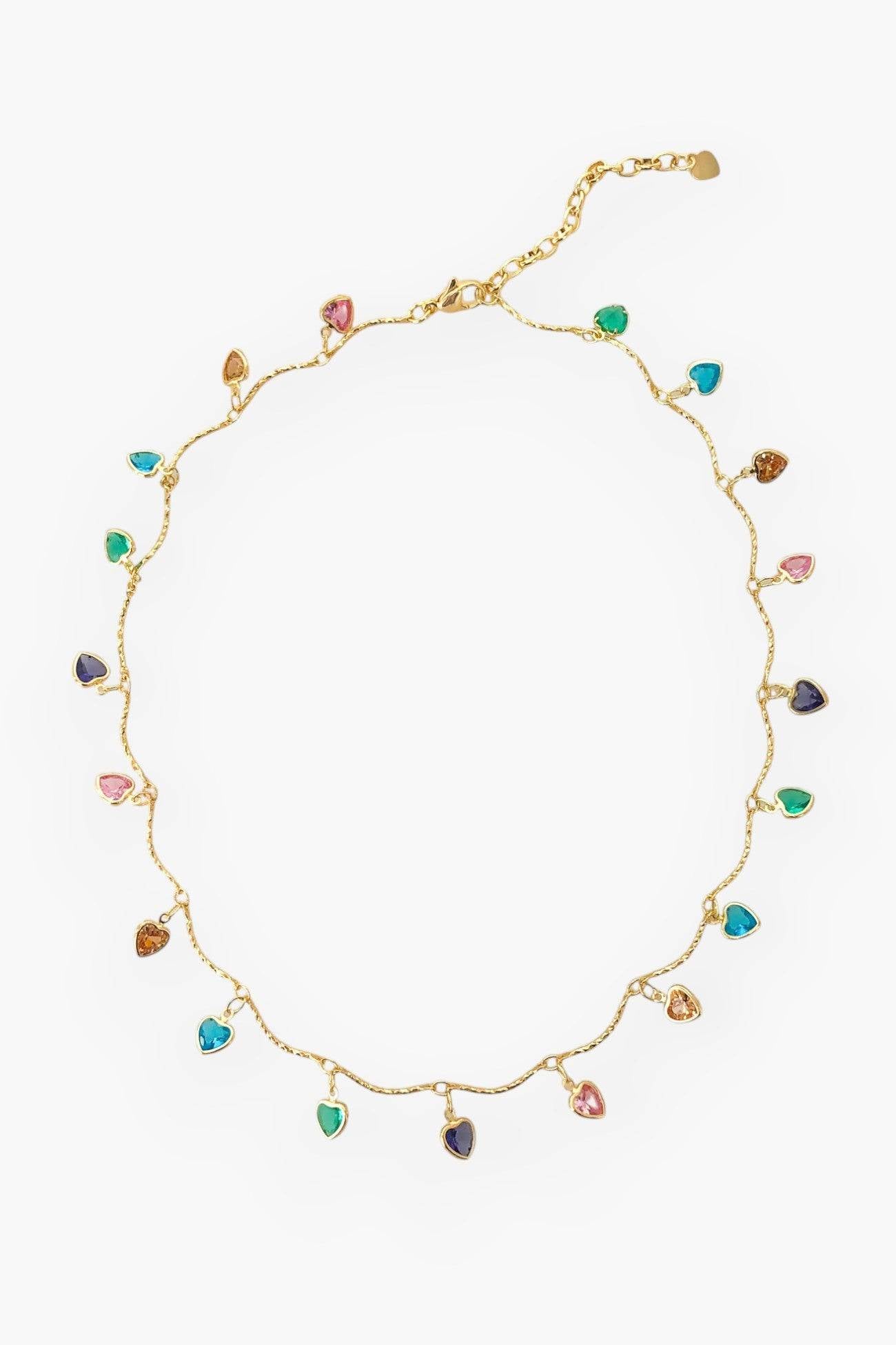 All Mine Colorful Heart Charm Necklace featuring multicolor cubic zirconia heart charms on a triple-plated 14k gold chain. A vibrant statement piece.
