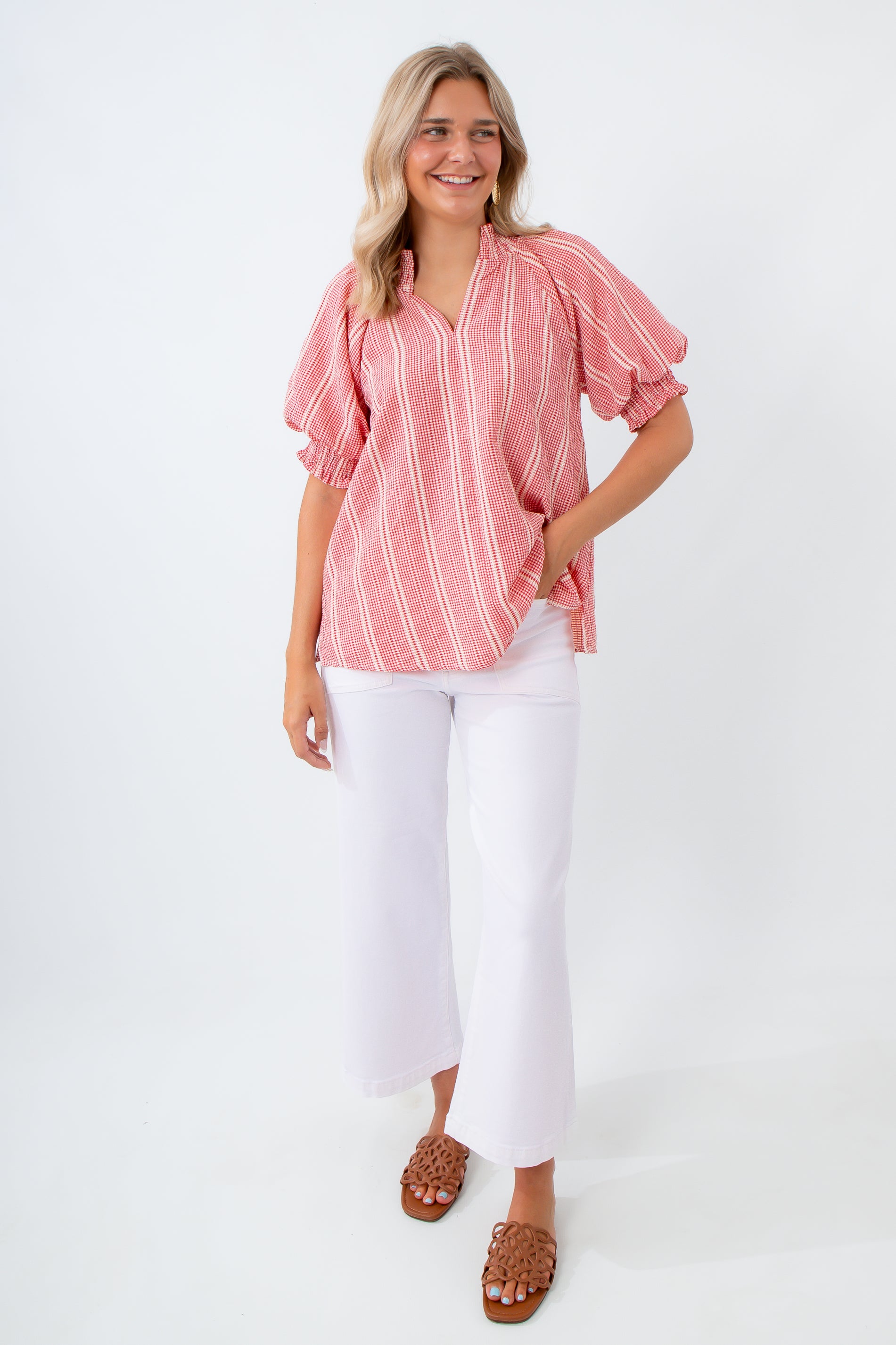 gingham check blouse with white jeans and gold jewelry
