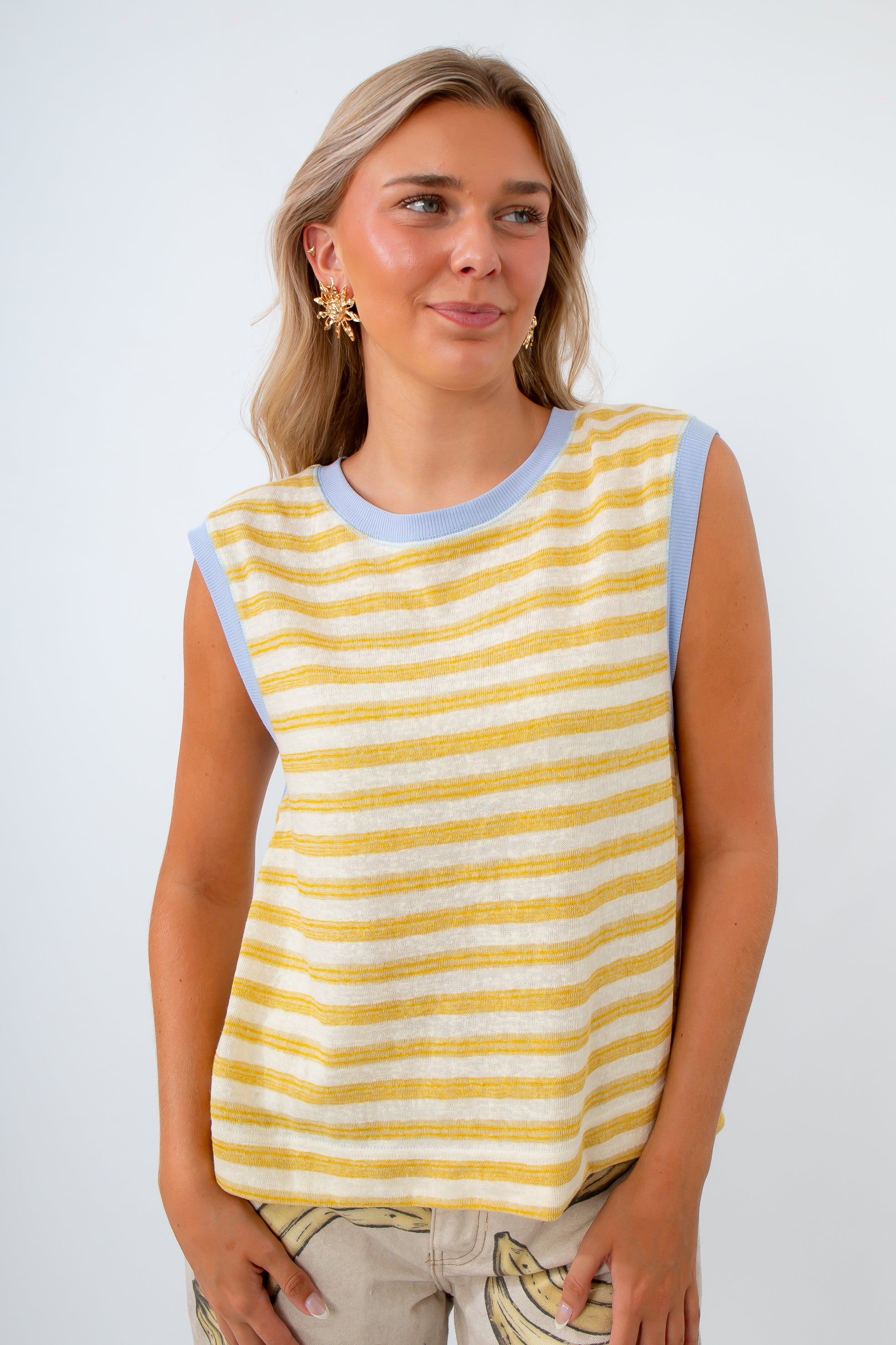 yellow stripe knit tank with blue accent styled with free people banana pant