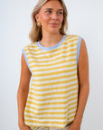 yellow stripe knit tank with blue accent styled with free people banana pant