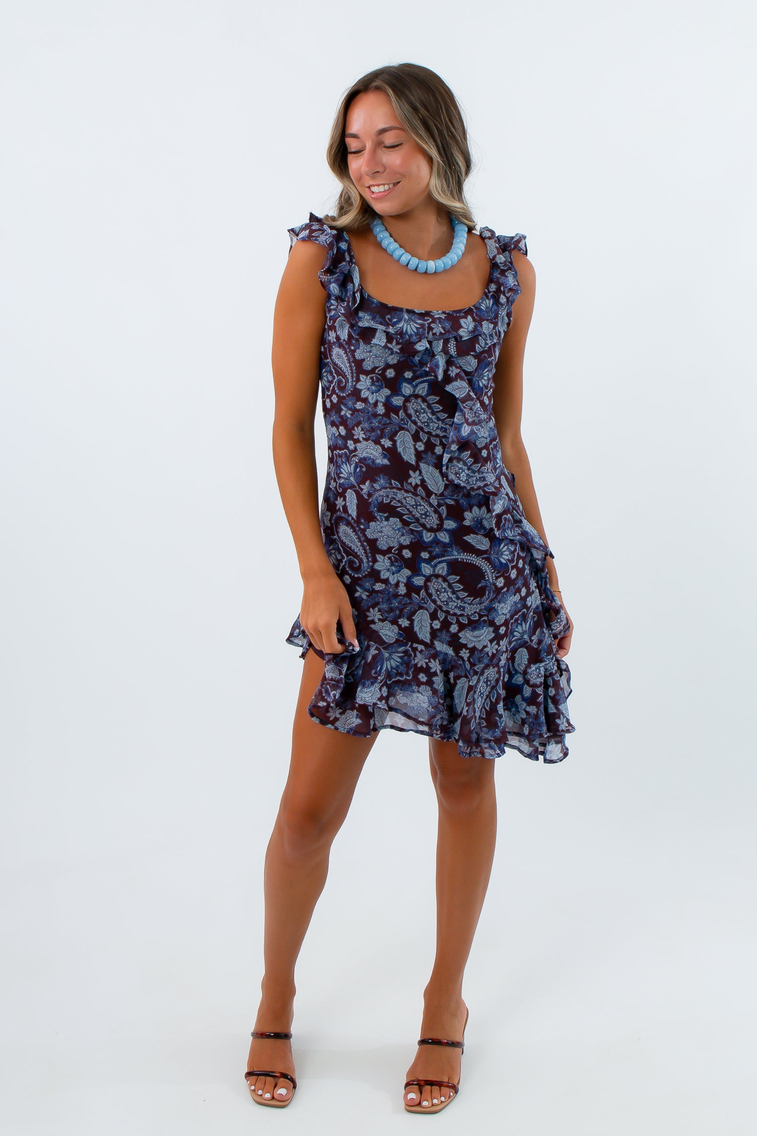 Parker Blue Paisley Floral Asymmetrical Mini Dress styled for fall wedding with beaded necklace