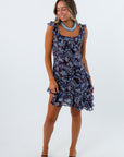 Parker Blue Paisley Floral Asymmetrical Mini Dress styled for fall wedding with beaded necklace