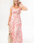 Chic MinkPink Midi Dress in pink and white with smocked top and tiered skirt, a stylish choice for beach days or casual events.