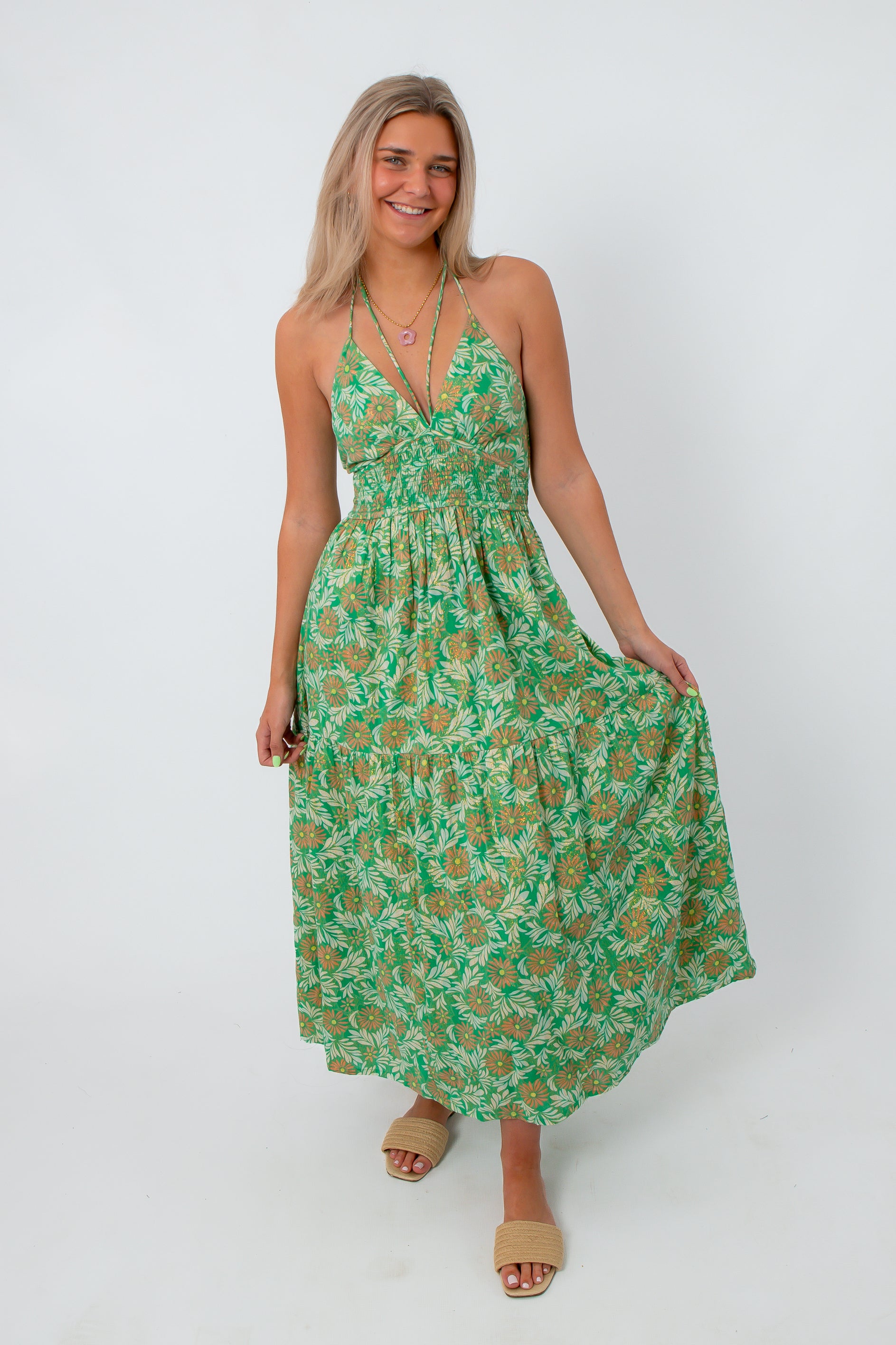 Green floral maxi dress with spaghetti straps, perfect for summer weddings and garden parties