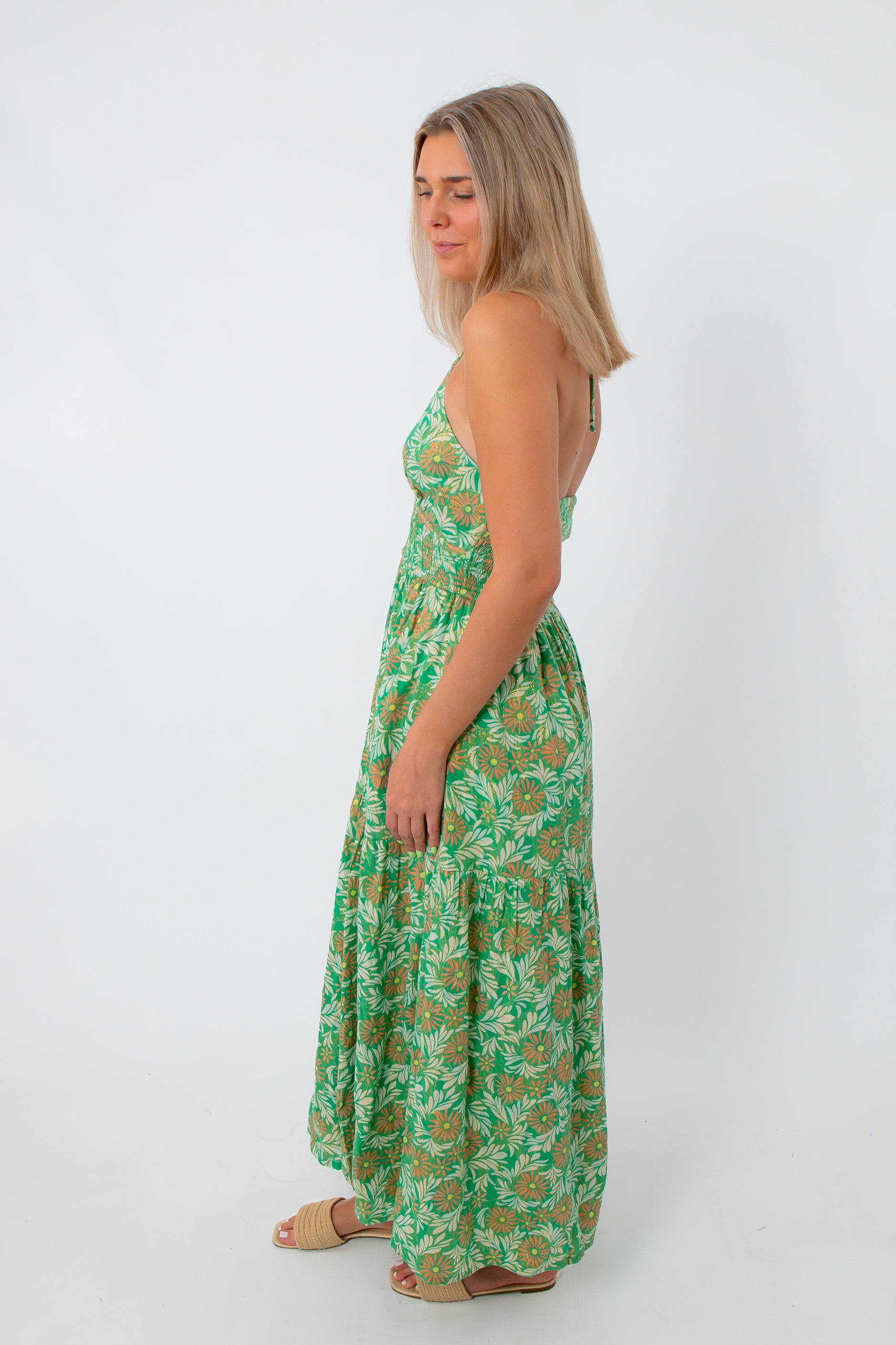 Green and pink floral maxi dress with spaghetti straps, side view