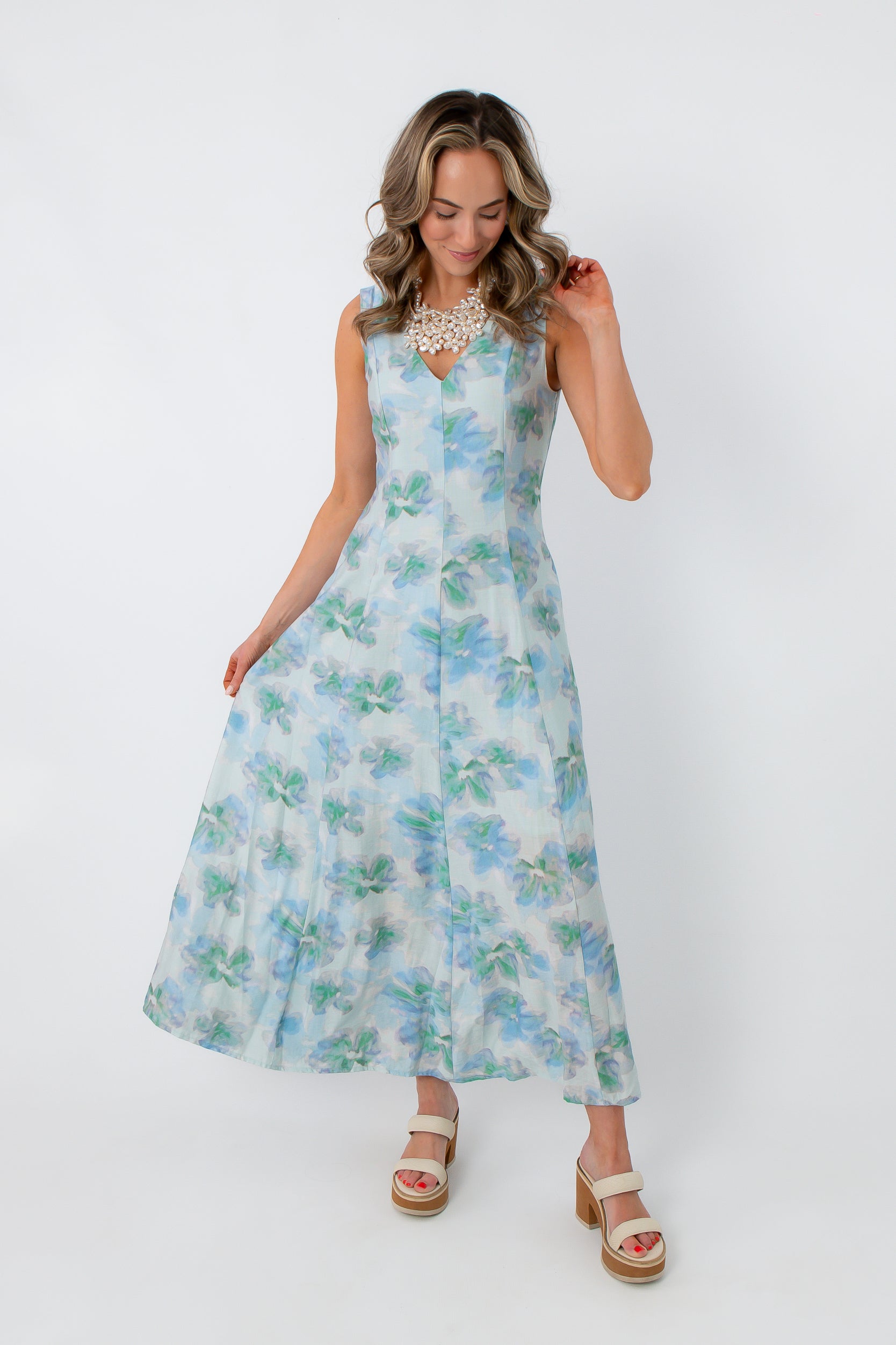 Watercolor Nymphéas Blue Floral Midi Dress with watercolor floral pattern, styled for spring wedding or Easter celebration
