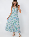 Watercolor Nymphéas Blue Floral Midi Dress with watercolor floral pattern, styled for spring wedding or Easter celebration
