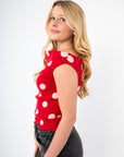 Side view of Retro Romance Red Polka Dot Asymmetrical Top showing cap sleeve and curve-hugging fit, perfect for Valentine's Day outfits.