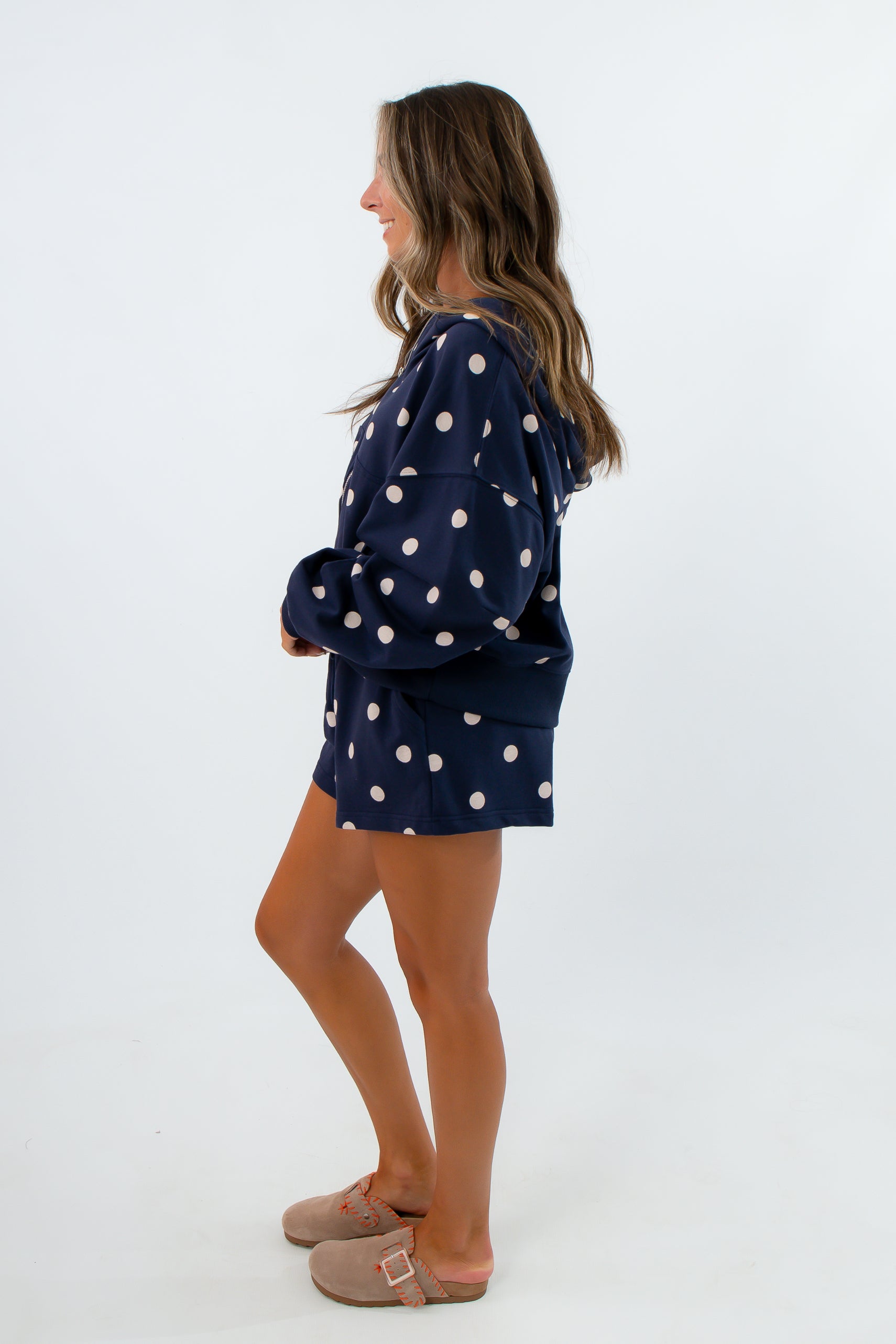 Matching lounge set navy polka dot shorts with zip-up hoodie, navy and white polka dot shorts set
