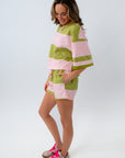 dopamine dressing for summer in pink and green stripe knit set