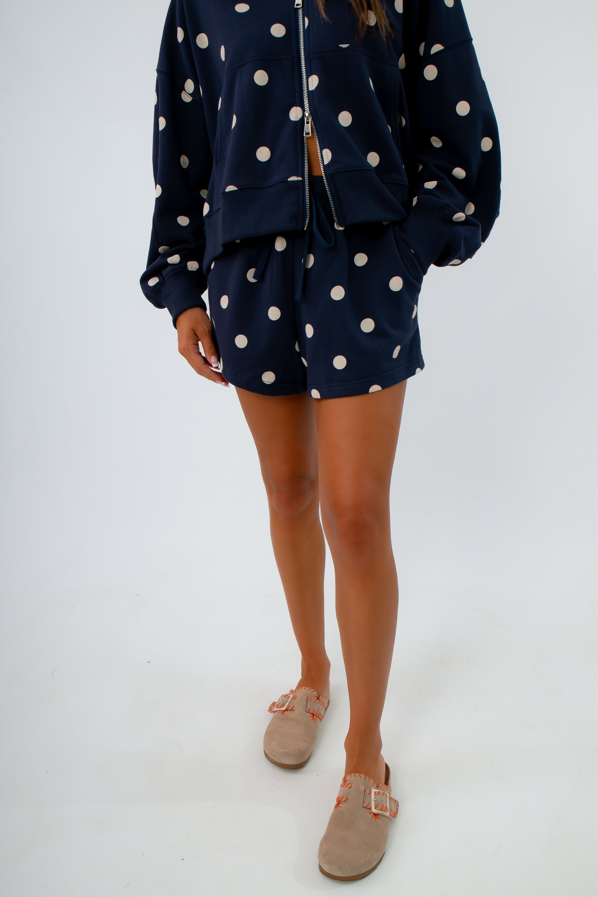 Navy and white polka dot comfy shorts with front and back pockets, navy polka dot matching shorts set