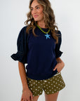 Uptown Girl Dark Denim Puff Sleeve Sweatshirt blouse with statement ruffles sleeves, comfy navy blouse, comfy navy top, comfy fall workwear