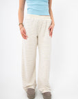 Layover Luxe Ivory & Blue Stripe Fleece Pants with relaxed fit and soft knit fabric, ideal for cozy loungewear or casual travel wear.