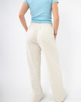 Back view of Layover Luxe Ivory & Blue Stripe Fleece Pants highlighting elastic waistband and breathable knit for casual, cozy style.