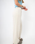 Side view of Layover Luxe Ivory & Blue Stripe Fleece Pants showing soft fleece texture and relaxed silhouette for loungewear comfort.