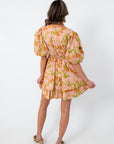 Floral mini dress with pink and orange tulip print, puff sleeves, and cinched waist, perfect for spring casual wear
