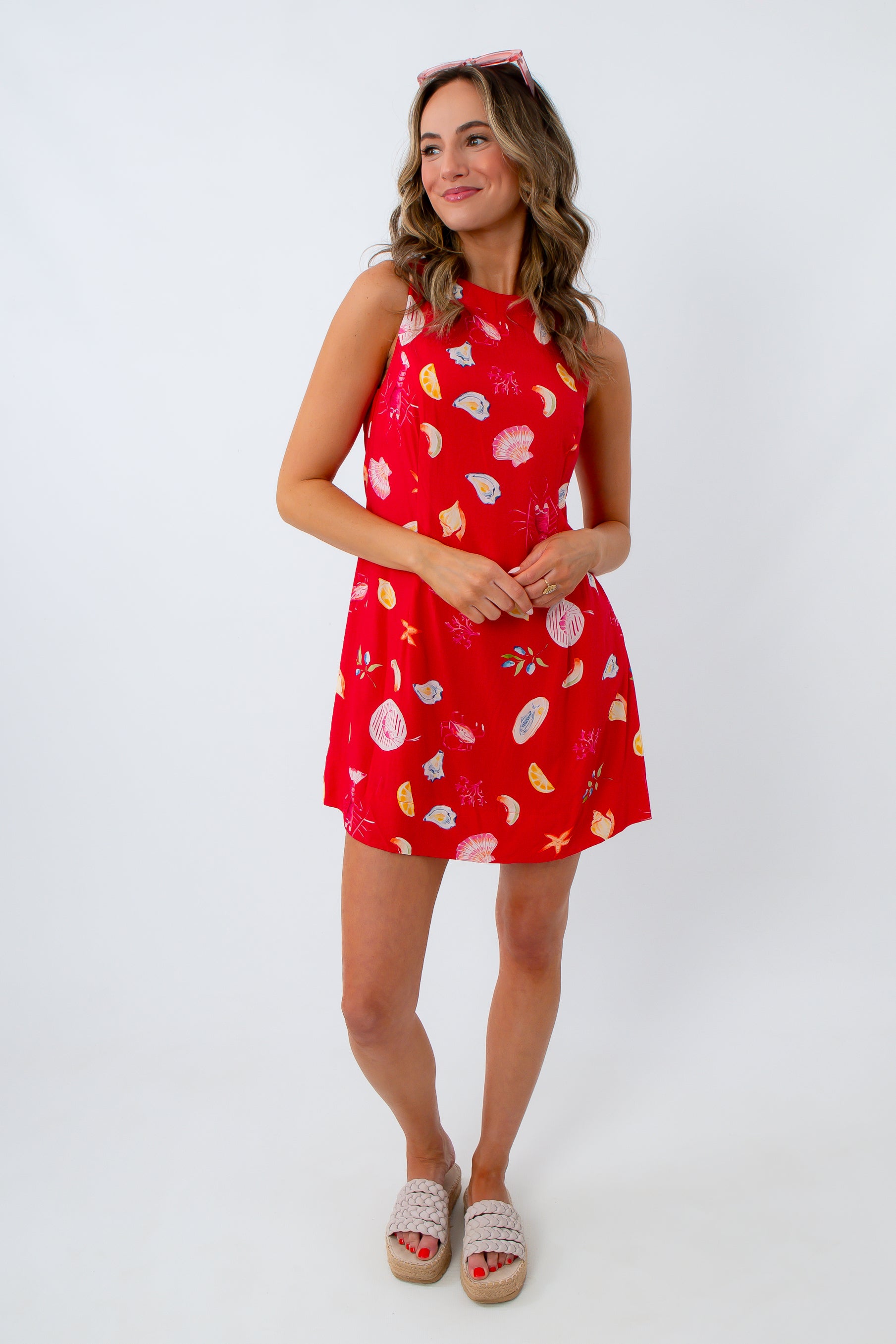 red beach print mini dress with seashells and oysters