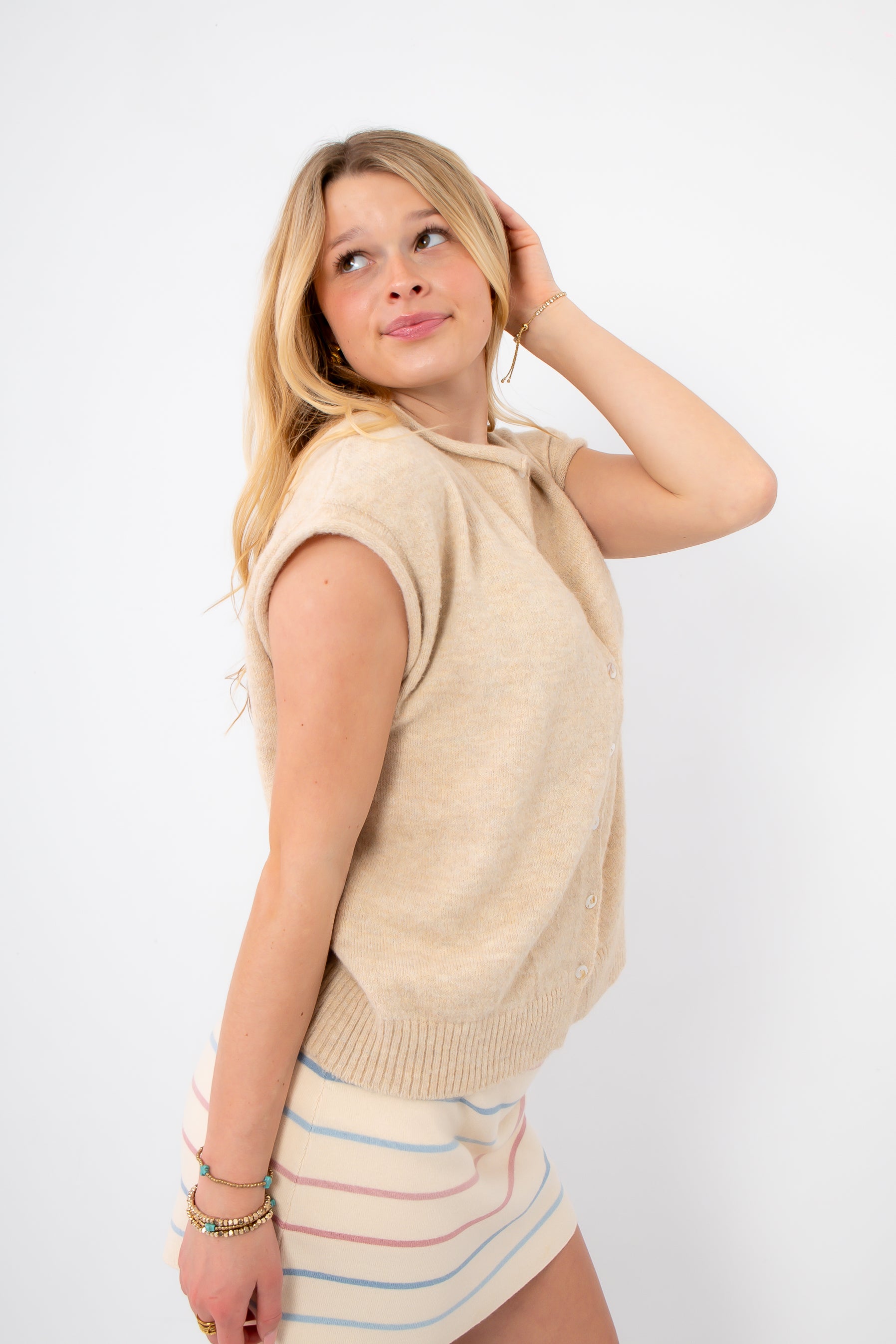 Piper Natural Short Sleeve Cardigan - side view of natural knit cardigan showing cap sleeves and soft texture for versatile styling.