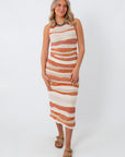 Knit midi skirt with sunset stripe pattern, beige and orange tones, summer beach style