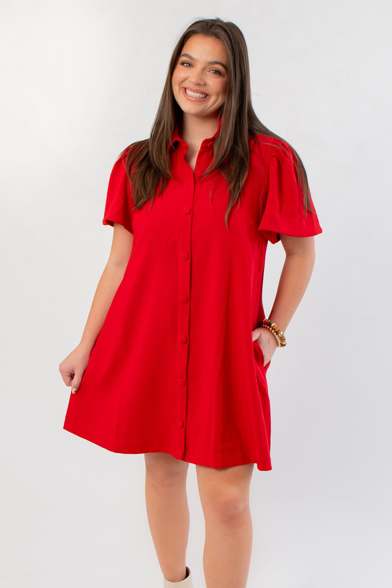 Eloise Red Crepe Button Mini Dress with short puff sleeves and front buttons, perfect for holiday parties and festive occasions.