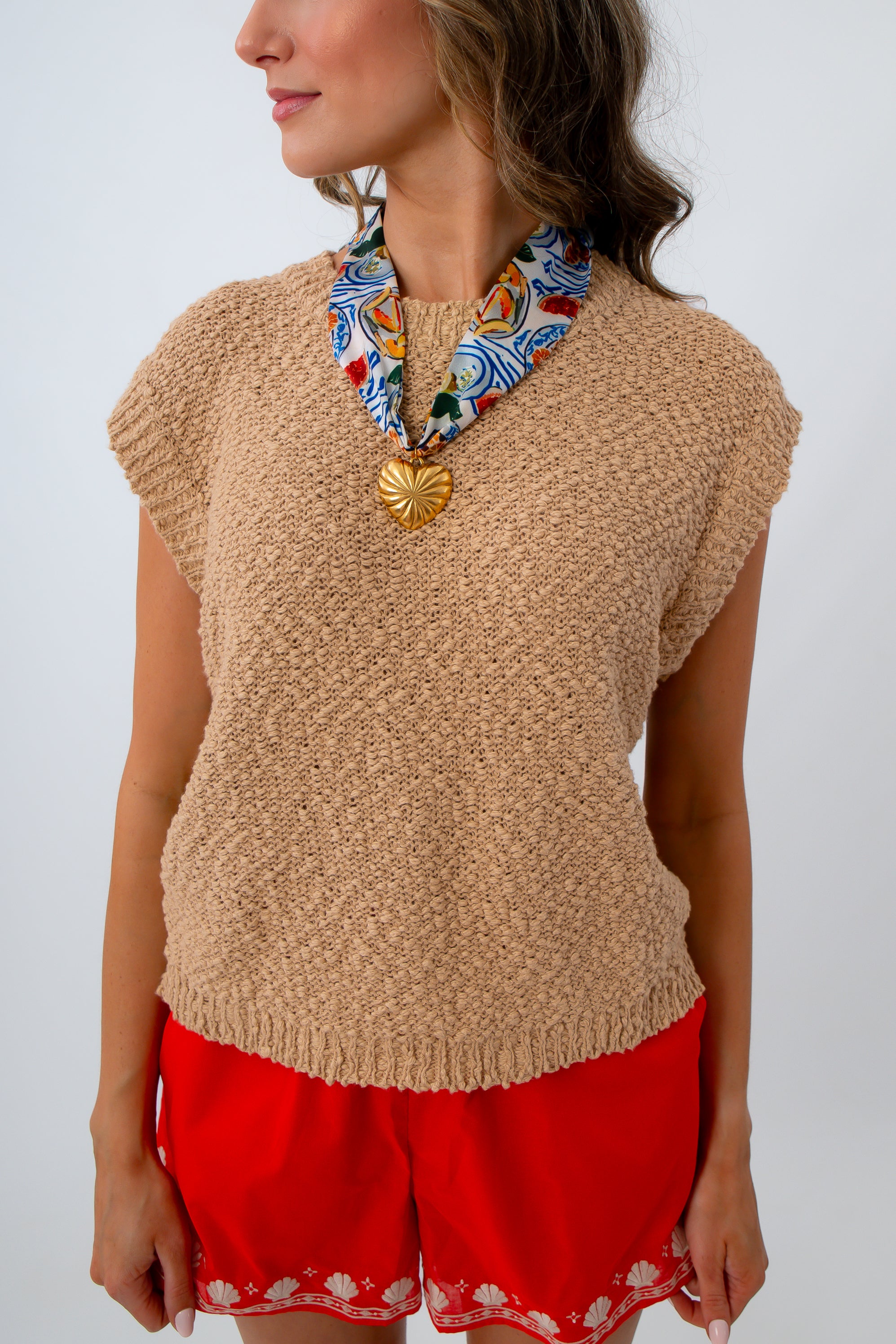 Tan textured sleeveless sweater for layering