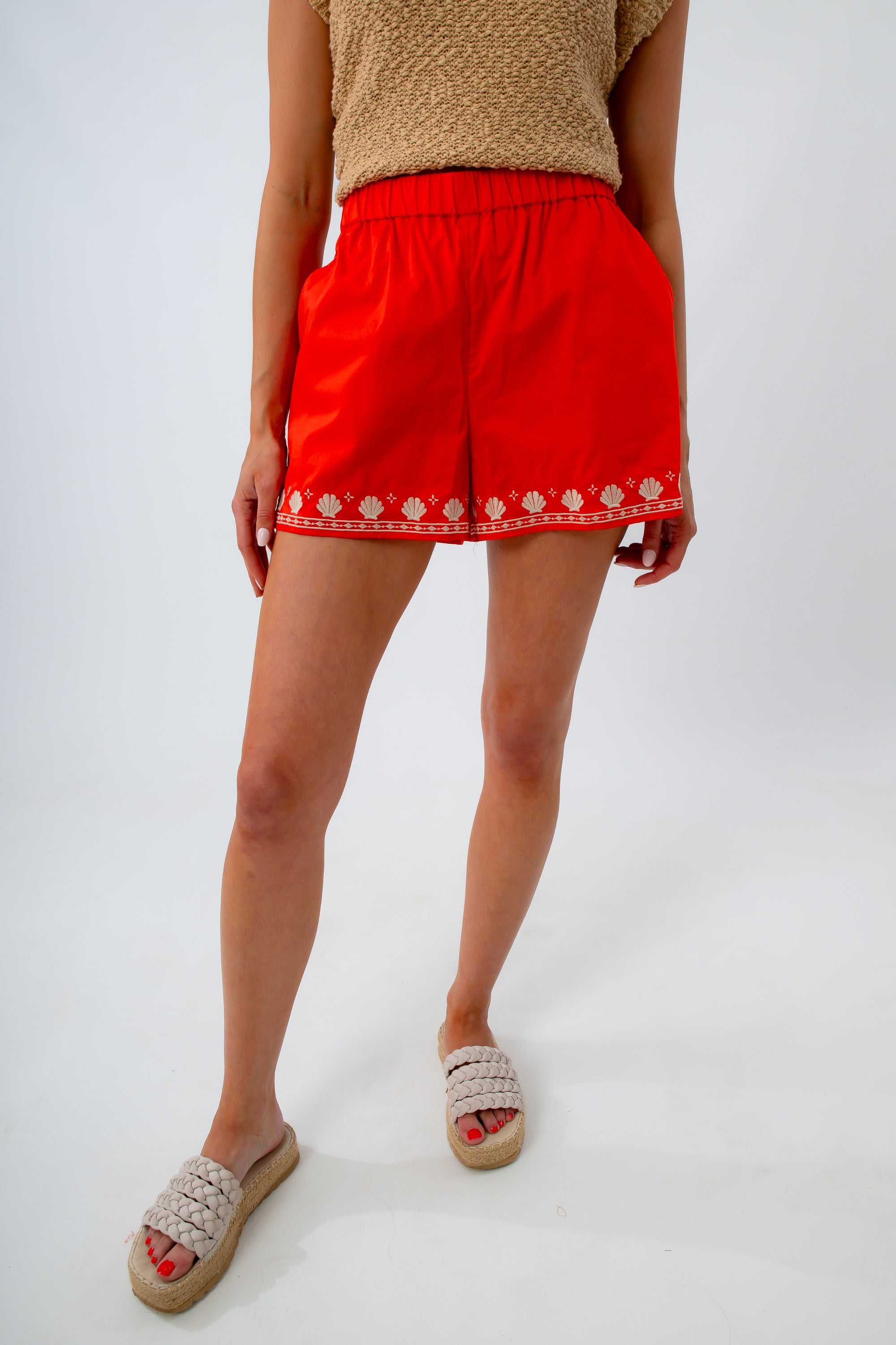 Embroidered shell border shorts in red