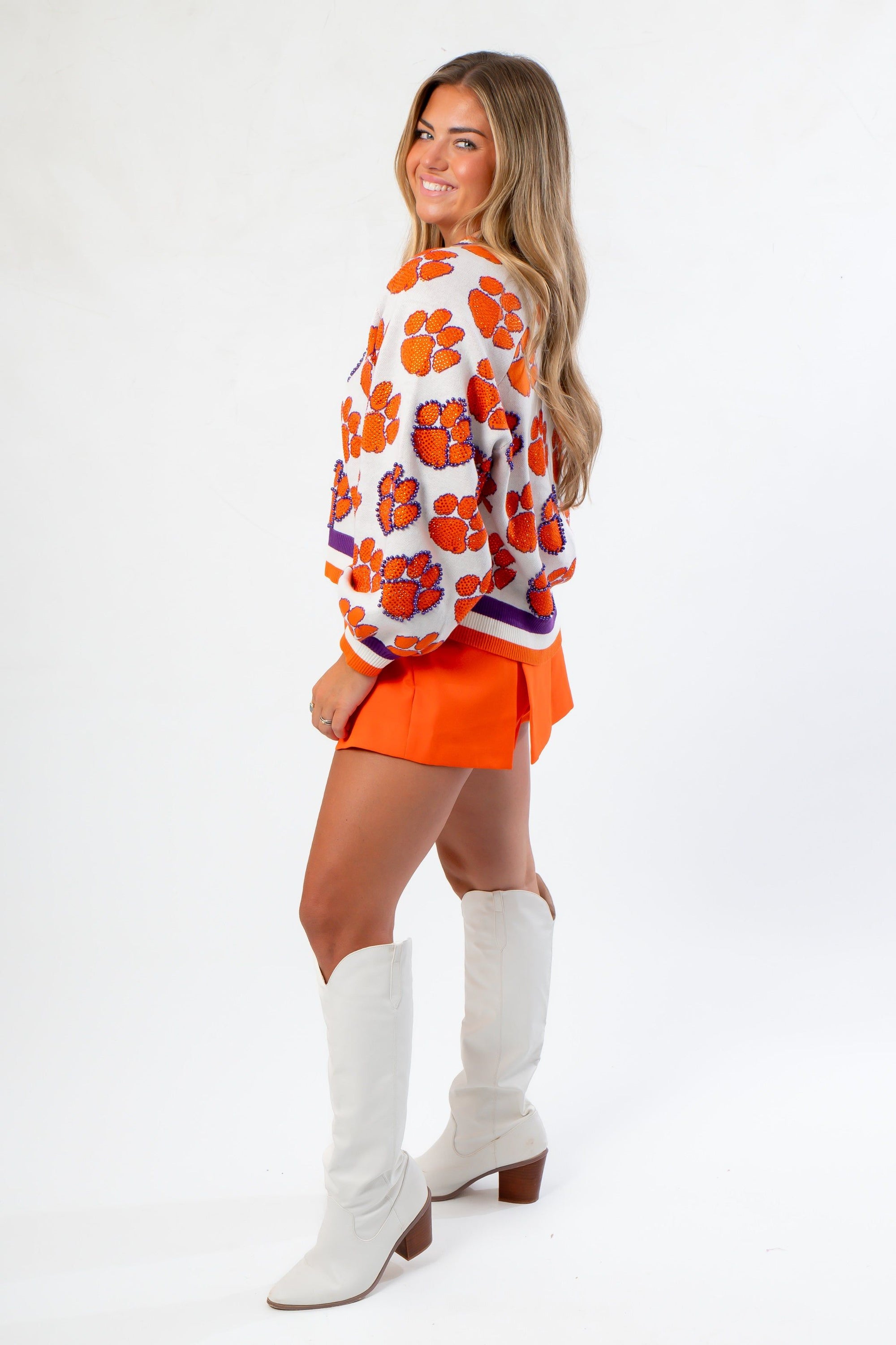 Side view of Queen of Sparkles Clemson Mascot Rhinestone Cardigan showing detailed rhinestone tiger paw design and cozy fit.
