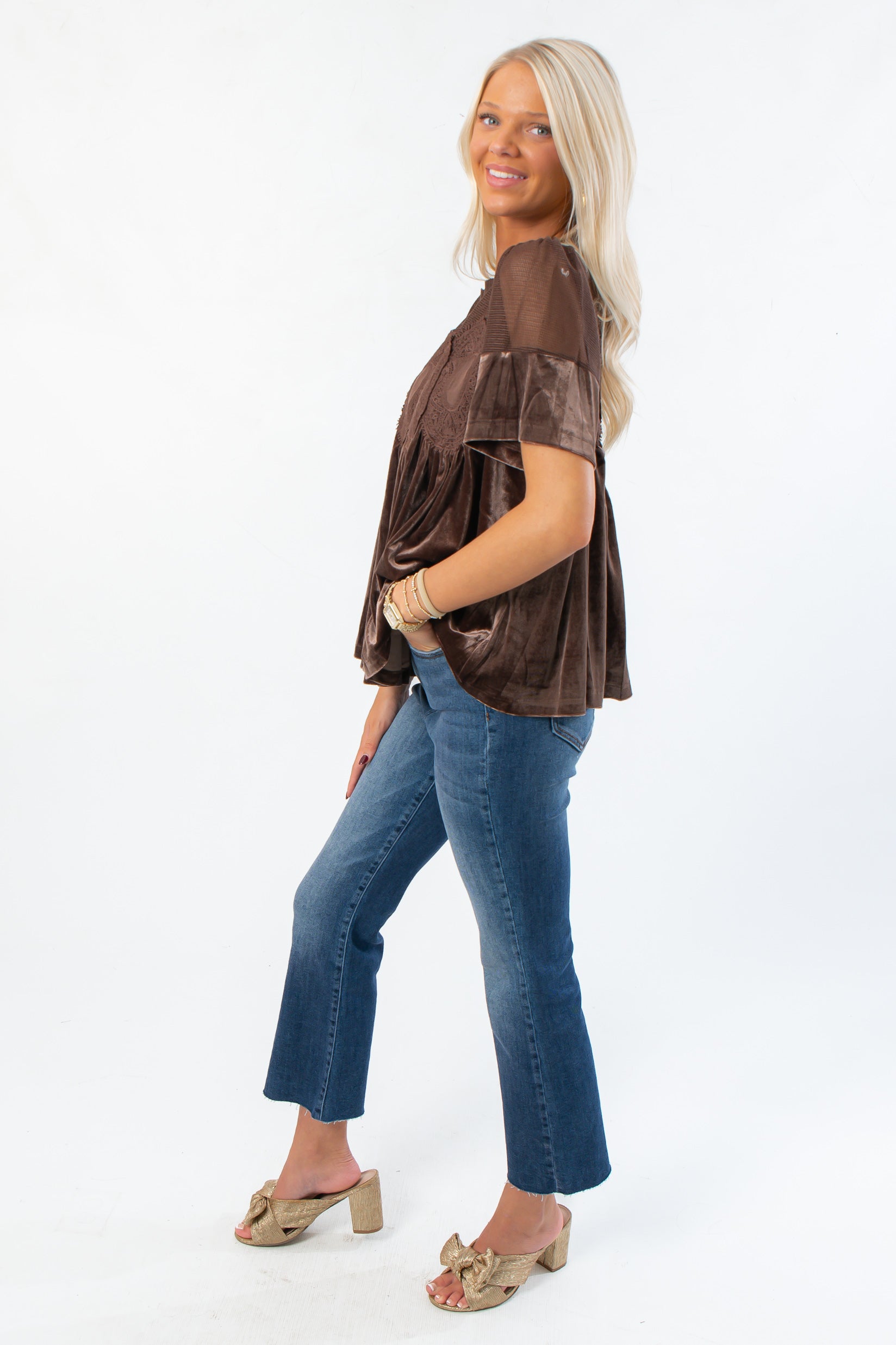 Side profile of Lacy Brown Velvet Babydoll Top showing flowy silhouette and soft velvet fabric. Perfect trendy top for fall and holiday outfits.
