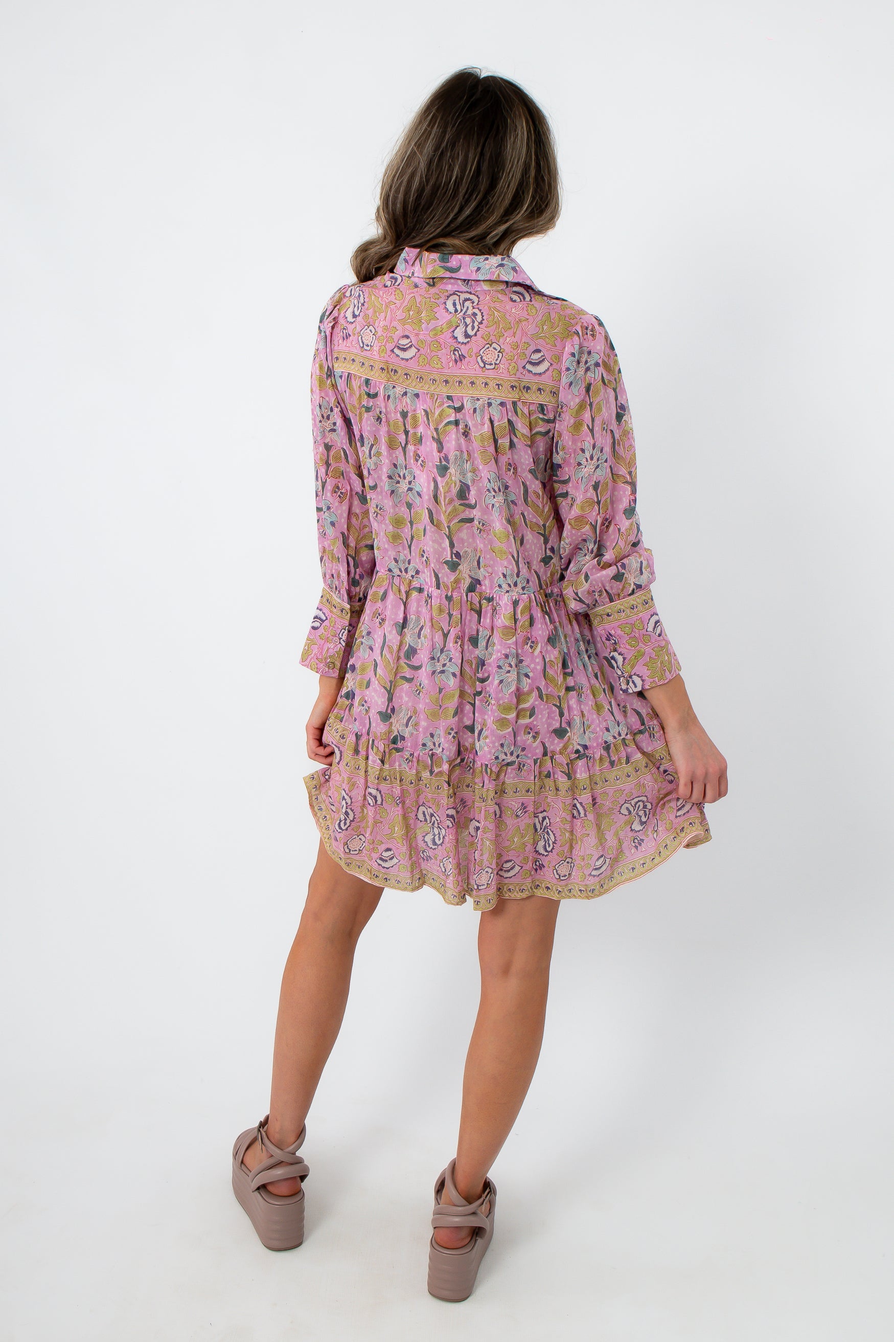 Pink floral mini dress with long sleeves and embroidered details
