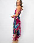 Side view of Tropical Jewel Satin Palm Print Maxi Dress showing flowy silhouette and adjustable straps for a flattering summer look.